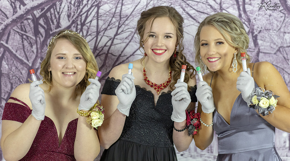 What Matters at Prom?  Posing with Tubes of the Trade!